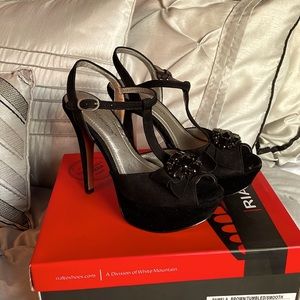 BCBG Platform heel with black rhinestone. Size 6 worn once great condition.